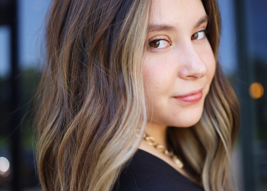 A caucasian female with Blonde and Brunette Hybrid Hair