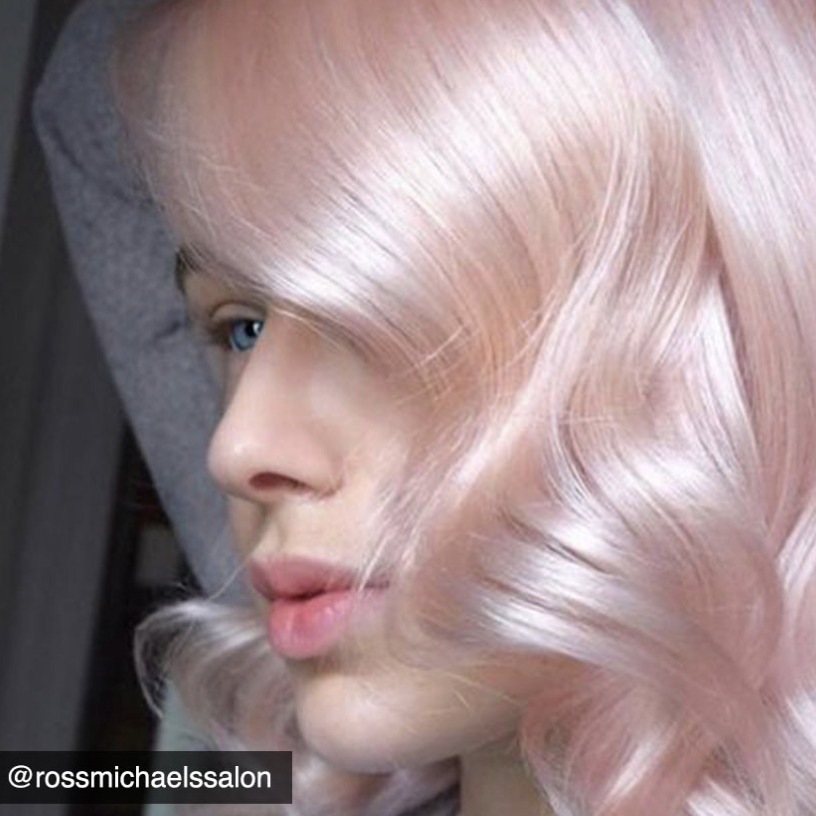 A caucasian female with wavy pink pearl hair