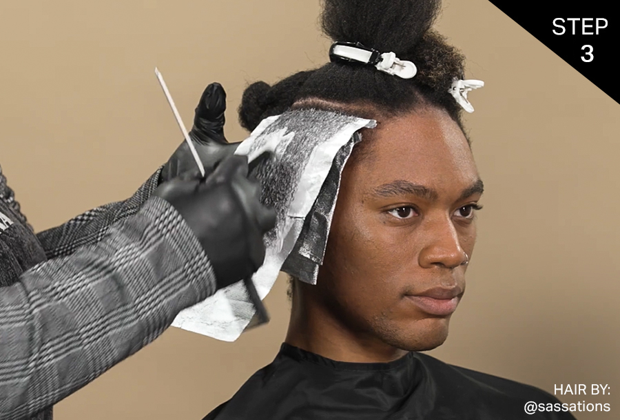 Step 3: Lightening Formula is applied using the global blonding technique ½” away from the scalp of the male model through the ends lifting to a Level 9