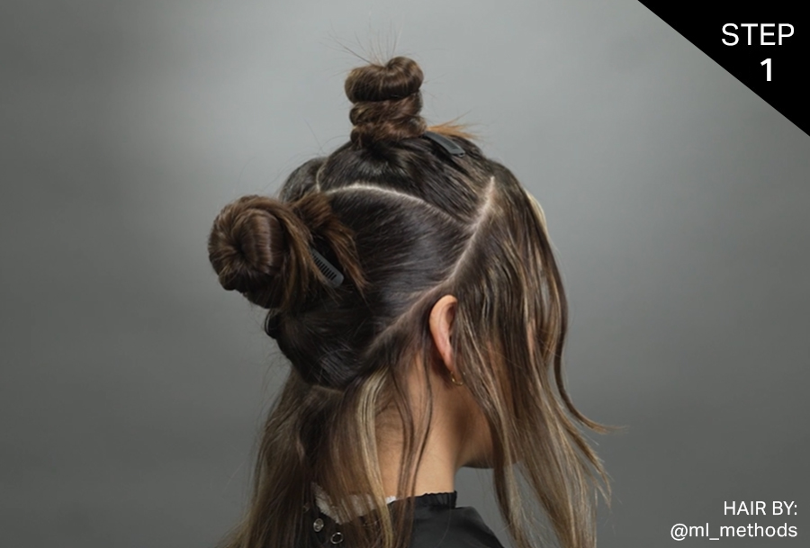 Sectioning hair of the female model into three sections