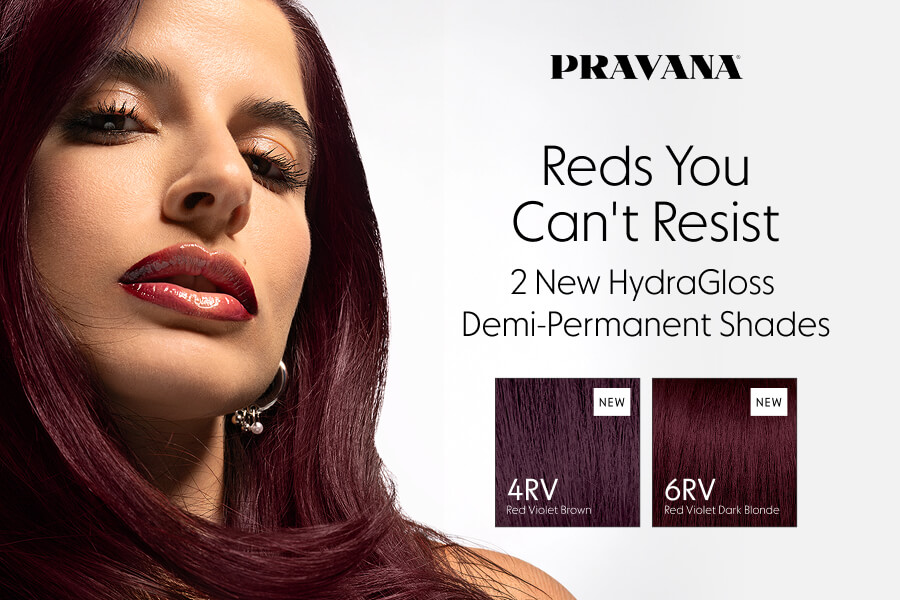 Model with glossy red violet hair promoting PRAVANA HydraGloss demi-permanent hair shades 4RV and 6RV demi-permanent hair color