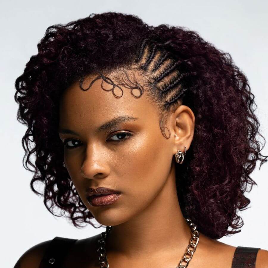 Woman with deep red‑violet hair color with intense wine tones and a dark, luxurious finish image by @jesstheebesttcolor