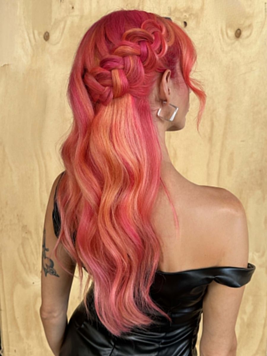 Blended coral, pink and pastel peach tones with a bright, dimensional finish created with PRAVANA ChromaSilk VIVIDS.