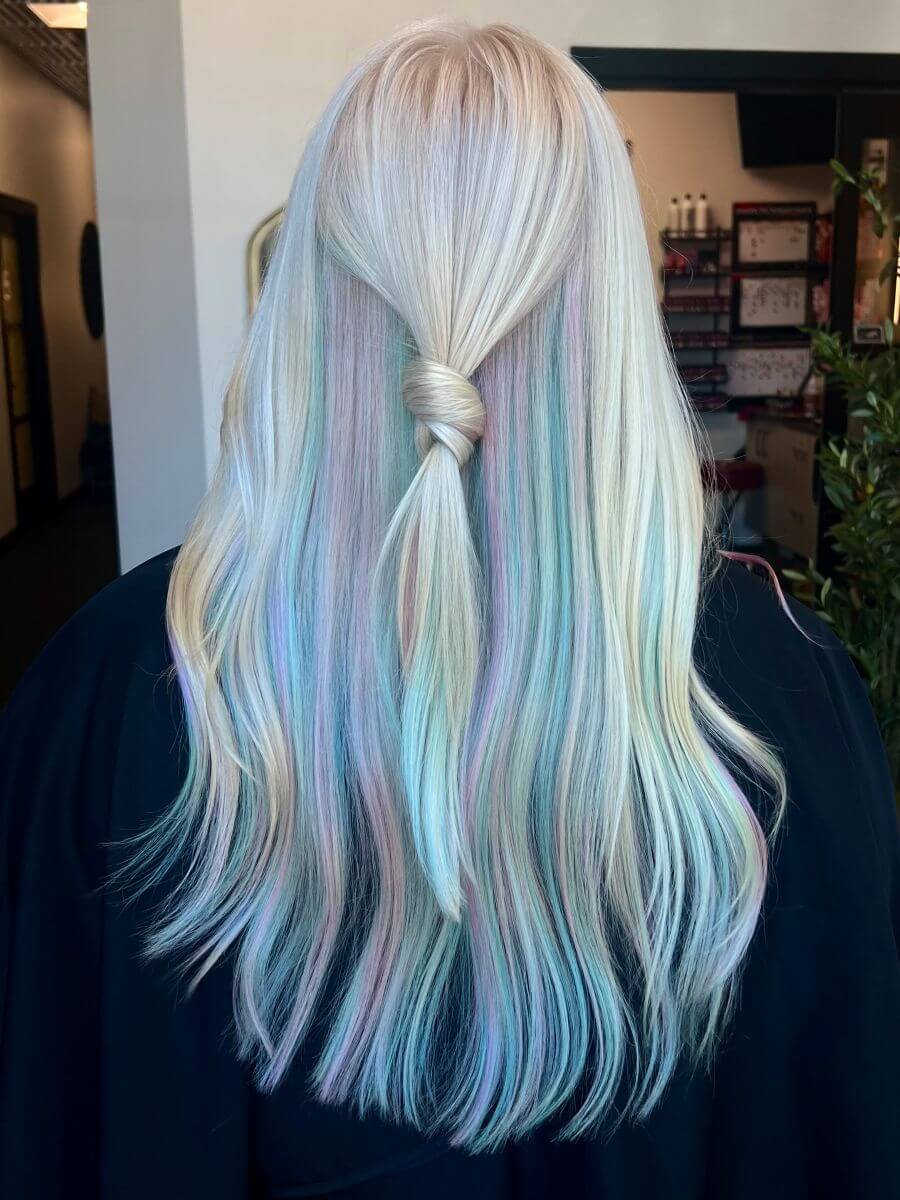 A prism of PRAVANA ChromaSilk VIVIDS Pastels shades against a vanilla blonde