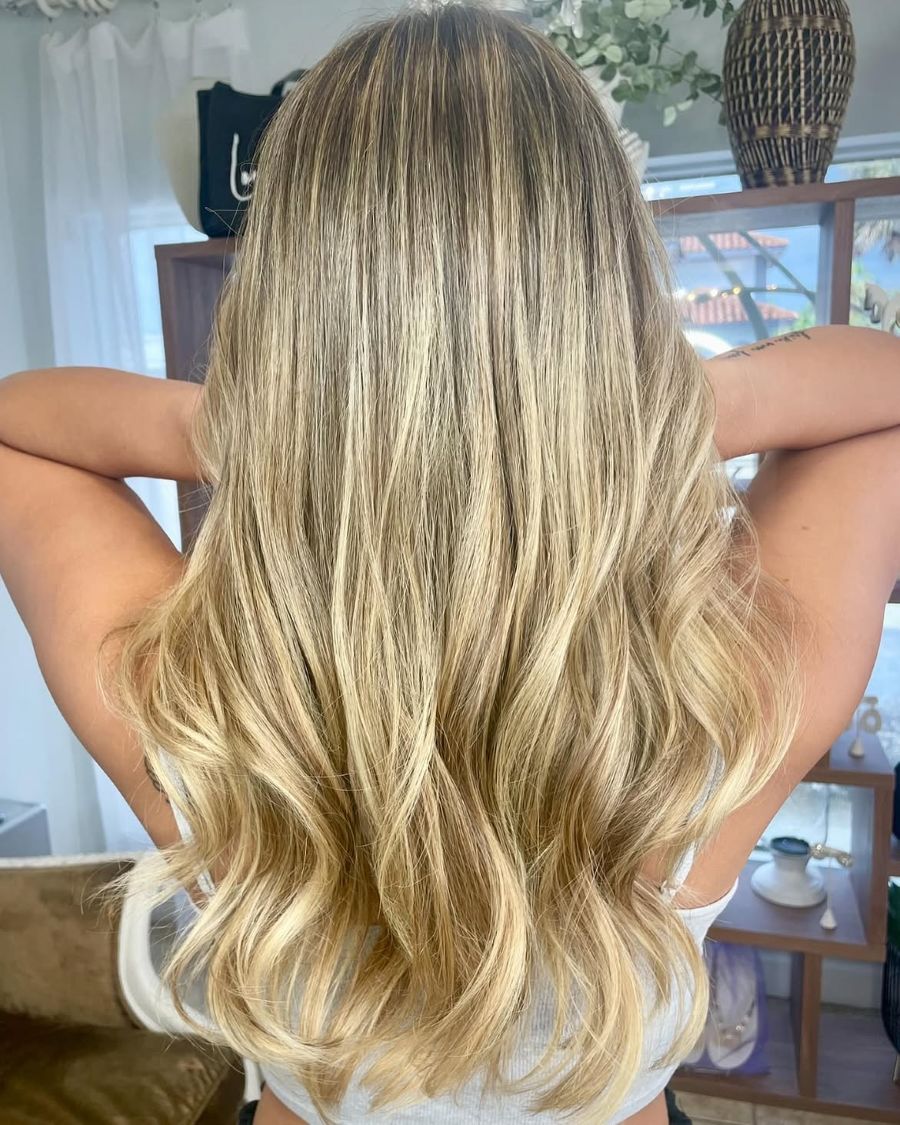 Lemon yellow blonde highlights sparkle in the sun like a Limoncello Tini.