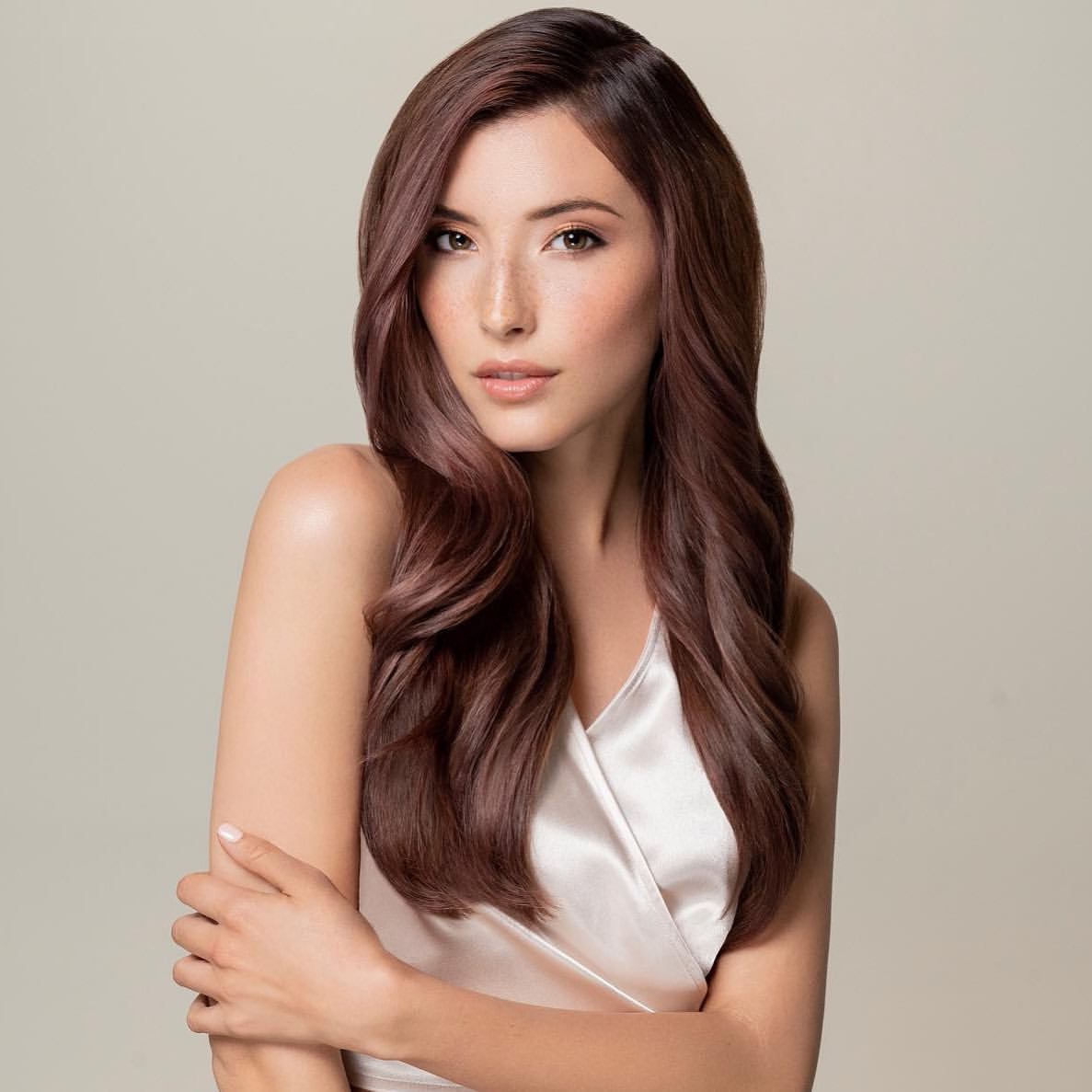 Natural-looking rose brown hair color created with a customer formula using PRAVANA ChromaSilk Creme Hair Color and PRAVANA ChromaSilk VIVIDS Everlasting, blending soft brunette and rosy fashion tones.